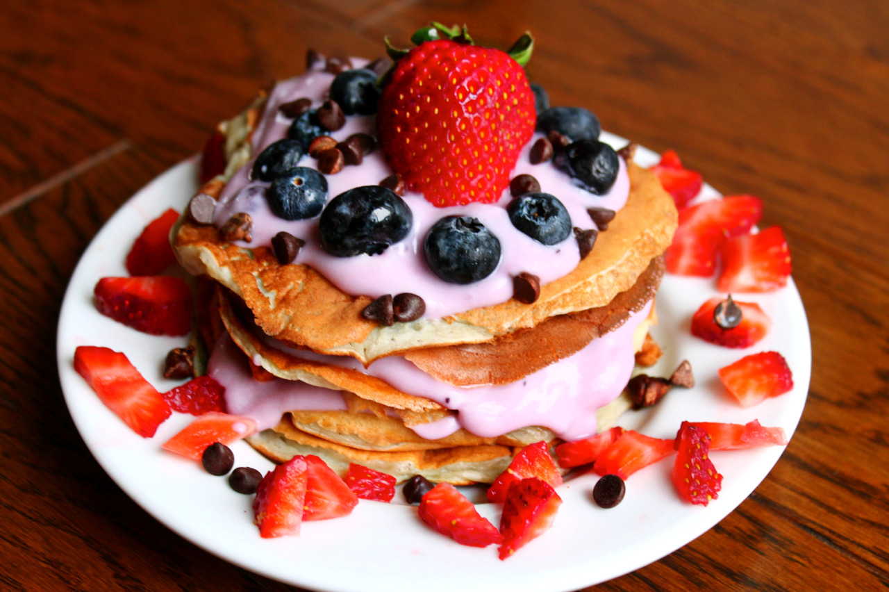 tessredefined:  Whole wheat blueberry yogurt pancakes layered with more blueberry