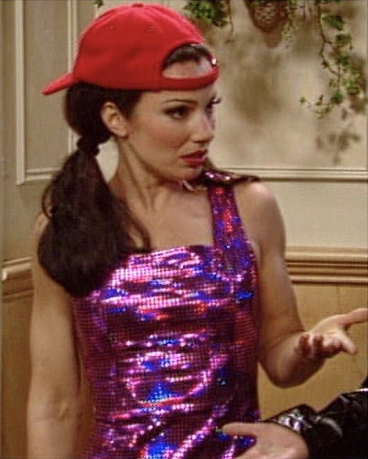 retroetic:Fran Fine pairing a baseball cap and pigtails with a holographic Versus