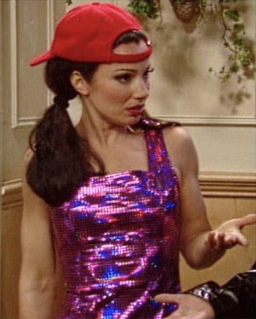 retroetic:Fran Fine pairing a baseball cap and pigtails with a holographic Versus Versace party dres
