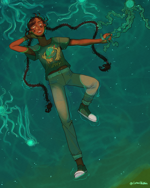 A digital illustration of Nona, a brown skinned girl with long black braids and yellow eyes. She is laying on her back in shallow water surrounded by pale blue jellyfish. One of her hands is tangles in the jellyfish's tentacles. Around her, the stars are reflected in the water.
She is wearing a print t-shirt with a picture of two hands grabbing at a planet shaped burger. Underneath, it reads "Yummy!" in wiggly yellow letters