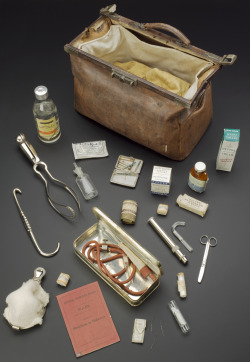 sixpenceee:Midwifery bag and contents, 1925-1955 located at the Science Museum, London. Until the middle of the 20th century in the UK, the majority of births still took place at home. They were usually attended by a midwife. This pigskin bag contains