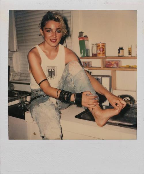twixnmix:  Madonna Polaroids by Richard Corman, 1983.In June 1983, 24 year old Madonna was rising on the club charts with singles Everybody and Burning Up. Photographer Richard Corman captured pre-fame Madonna at home one month before the release of her