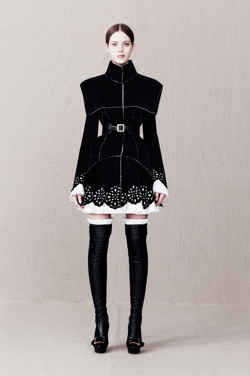 gothiccharmschool:  The black &amp; white coat! Lots of interesting, pretty designs
