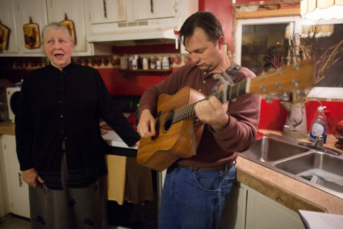 © Lauren PondA talented musician, Mack Wolford strums his guitar while his mother, Snook, sings alon