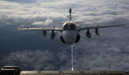 militaryarmament:  Naval aviators with Marine Tactical Electronic Warfare Training Squadron 1 take to the sky in an EA-6B Prowler during routine training above eastern North Carolina, April 14, 2015. 