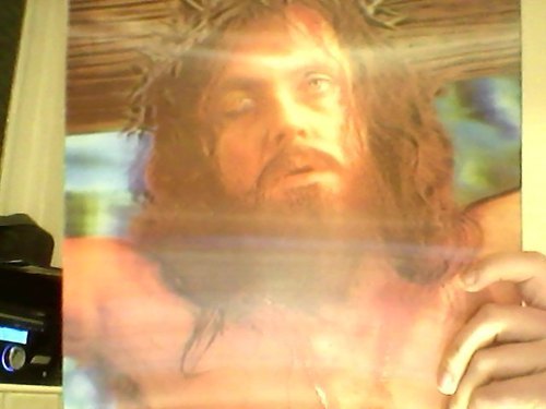 throbinhood:  my most prized possession is a holographic image of jesus that i have  where he blinks when you move him  and if you angle it right he’ll wink  oohhhh jesus you saucy devil you 