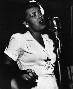 hennyproud:   Billie Holiday photographed by Ronny Jaques at the Down Beat Club, c. 1943  