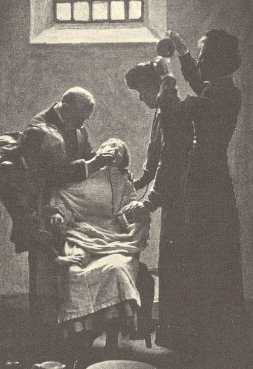 A suffragette is force-fed during her hunger strike in HM Prison Holloway, early 20th century.