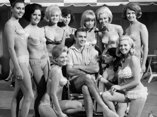 Sean Connery and a bevy of beauties; production still from Guy Hamilton’s Goldfinger (1964)