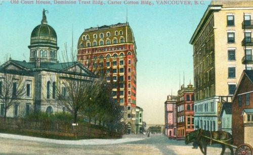 pasttensevancouver:  Cambie looking north from West Pender, n.d. Postcard showing the old court house (1890-1911), the Dominion Trust Building (completed 1910), and the Carter Cotton Building (1908). The Edgett Building on the northeast corner of Pender