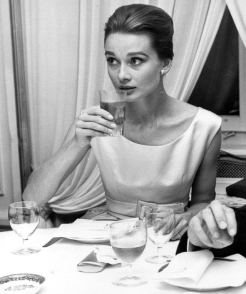 rareaudreyhepburn: Audrey Hepburn photographed by Hans Gerber attending a reception after the premie