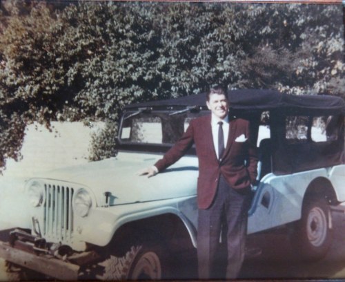 eugenesisland:  Ronald Reagan and his 1962 CJ6.  If you look at the lower photo real close you can see specks of the original “jade tint” (or maybe “foam green”?)   paint  under the repaint (brown or burgundy depending on which photos you look