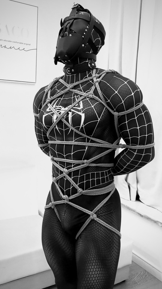 An Amazing Blend Of Rope, Leather, Muscle, And Superhero Costume. Perfection