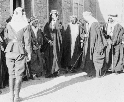 telawrence:Prince Feisal greets Lowell Thomas; T.E.Lawrence is to the right of Feisal, 1918.