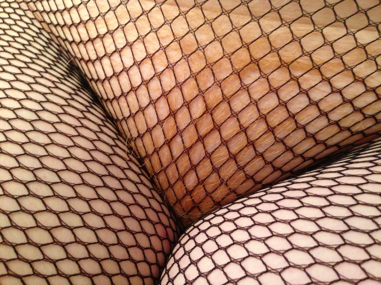 jmat84:  Me, hairy redhead, fishnets and pink bits ;-)