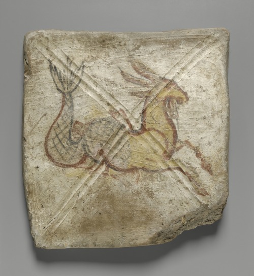theancientwayoflife:~ Painted Ceiling Tile with Capricorn. Date: ca. A.D. 245 Medium: Clay with a la