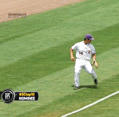 Alex Bregman catches the ball after it bounces off