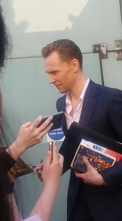 lolawashere:Tom Hiddleston and his dog eared copy of The Night Manager. They have come a long way to