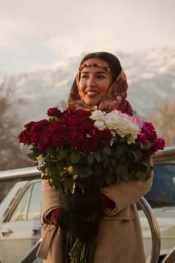 farsizaban:Girl selling flowers in Tehran,