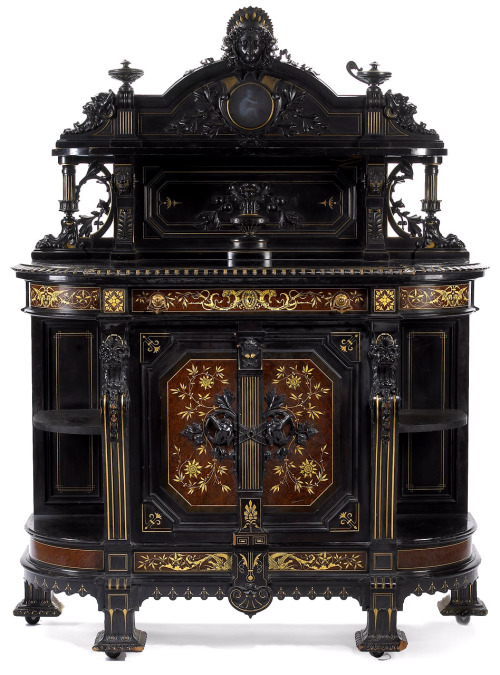 highvictoriana:An American Renaissance Revival parcel-gilt, carved and ebonized cabinet. Herter Brot