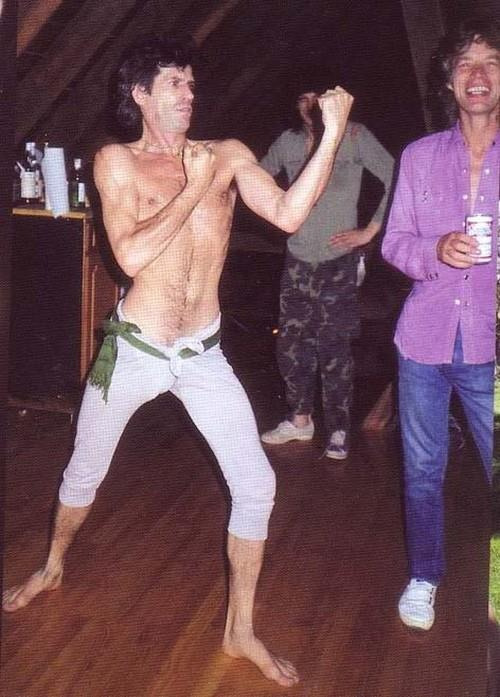 lbgstokedonspokes:  Keith Richards, Mick Jagger, and Ronnie Wood in the back wearing mismatched shoes. 