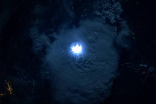 earthstory:  Lightning from space. This stunning image of lightning in the clouds of West Africa at 