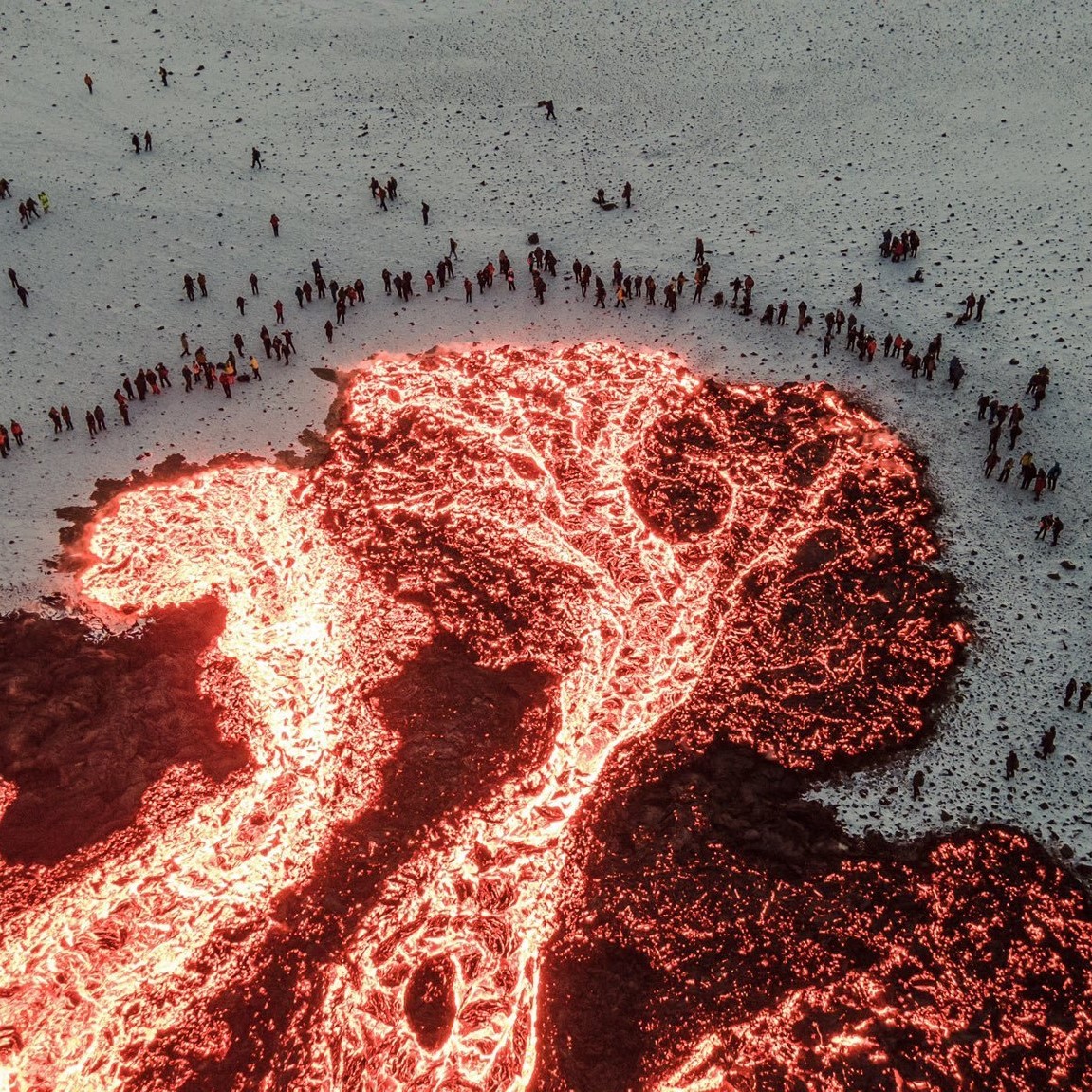 synqra:
“ People gathered around lava, Iceland.
”