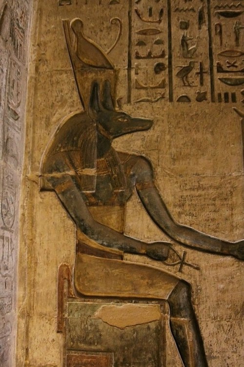 The God AnubisRelief depicting the jackal-headed god Anubis, seated and wearing ‘Pschent’, the Doubl