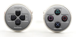 gamefreaksnz:  Video Game Controller Cufflinks US ร.95  Handcrafted with a crystal clear glass dome on top that enhances the artwork.  [via Fashionably Geek] 