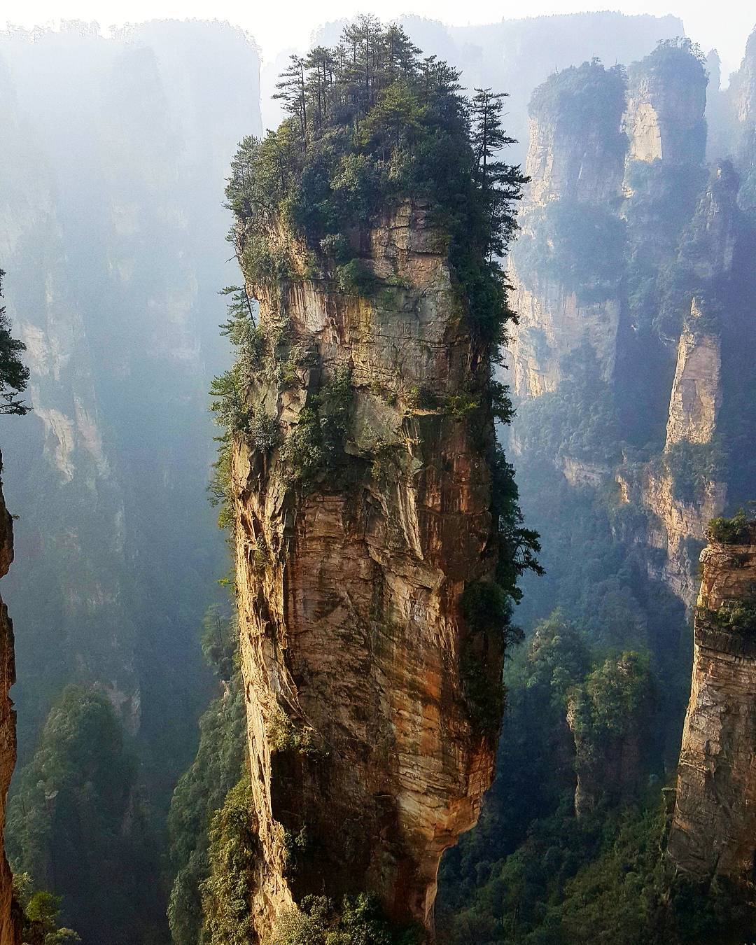 Avatar Mountains - Zhangjiajie, China - Also known as inspiration for Pandora P.S The echo here is incredible [OC] [1080 x 1350] via /r/EarthPorn http://ift.tt/2vJAjfk