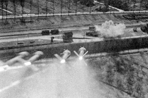 tanks-a-lot:A gun camera picture of a rocket salvo, launched by a Hawker Typhoon towards railway wag