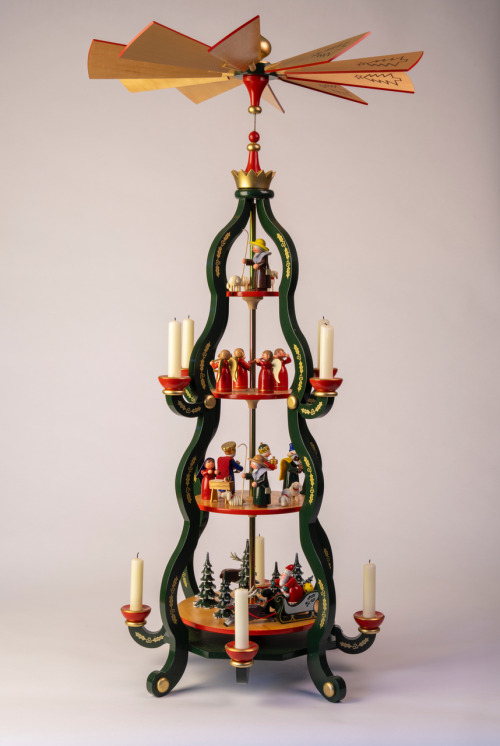 ADVENT CALENDAR DAY TWENTY TWO This Nativity pyramid, made in the shape of a Christmas tree, was han