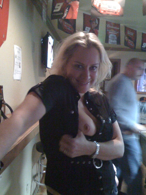 badgirlsflashing: &ldquo;My beautiful and sexy cougar flashing at a pool hall. Love when she get