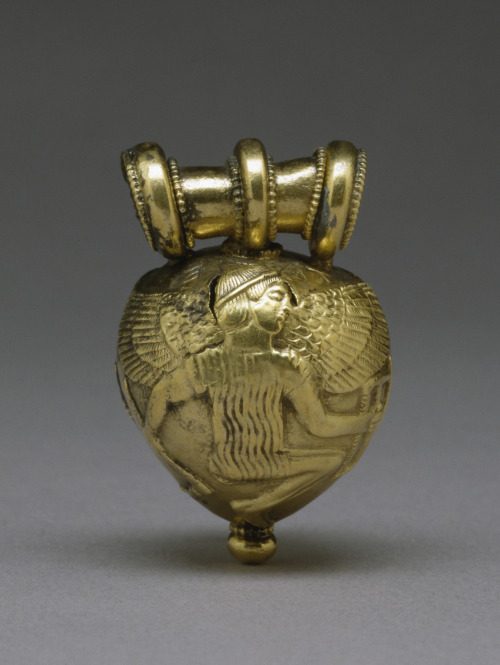 lionofchaeronea:Gold Etruscan bulla (hollow pendant) bearing an image of Daedalus and Icarus.  