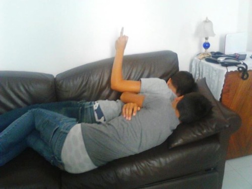 XXX sagginboys:  Sagging buds on the couch photo