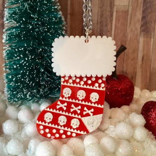 Seeing as you like the last one so much here is a cute little Christmas stocking with skull and cros