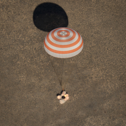Touchdown! A Soyuz spacecraft is seen as it lands with astronaut Shane Kimbrough of NASA and Russian