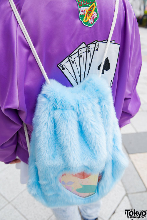 18-year-old Meguro on the street wearing a Nadia Harajuku jacket over a Joyrich “PARIS” 