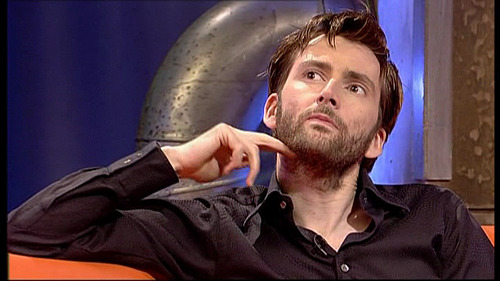 licensed-to-ruffle-dat-hair:  mizgnomer:  David on Totally Doctor Who The hands.  The scruff.  A bonus ear-tug.  What’s not to love? Happy Tennant Tuesday  Oh my Stars!!!!!*ded* 