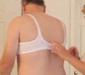 wifecuckshubby:  Being put in a bra by my Sexy FemDom Cucktress Wife. She feels feminization