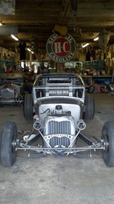 the-forward-observer:  enginedynamicsinc:  A work in progress : Inside the shop with Jeb Greenstone at CutWorm Specialties Inc.   Holy crap that’s cool!