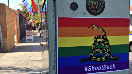 brazilianwaxguns:priceofliberty:West Hollywood plastered with rainbow #ShootBack signsStickers and p