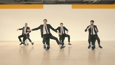 digg:  OK Go is up to their old tricks again.  btw all those colored dots are people