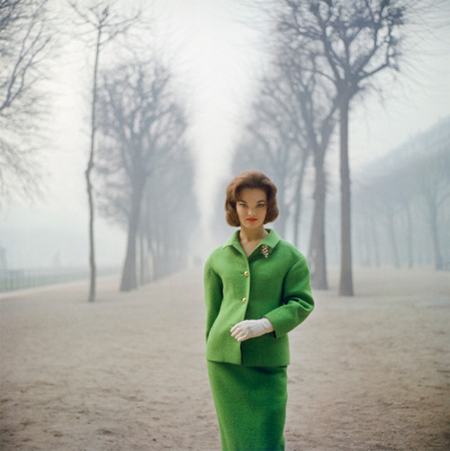 Mark Shaw, Henrietta Tiarks, the Dutchess of Bedford, models a green suit by Jules Francois Crahay o