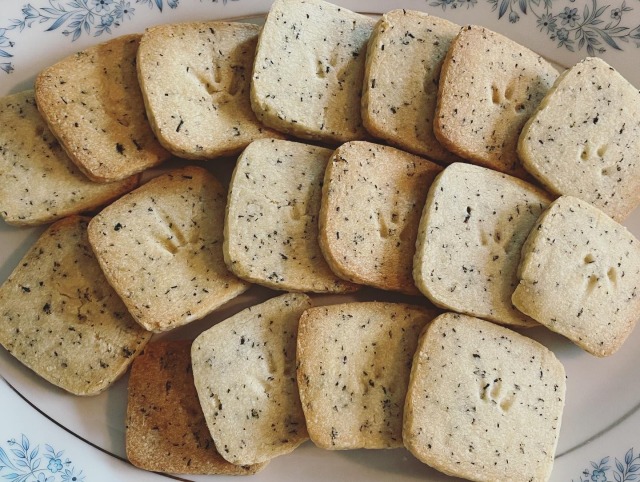 An ornate plate of freshly baked shortbread cookies