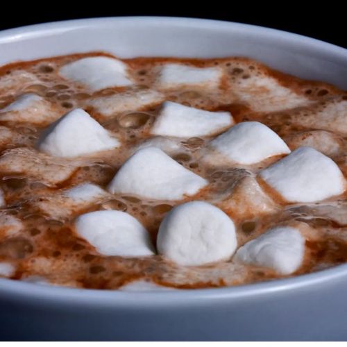 The perfect marshmallow to cocoa ratio. Delicious to the last sip.  . . . Hashtags: #cocoacauldron #