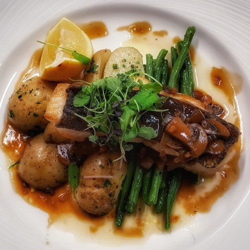 Pan fried black cod with mushrooms, ginger sauce, green beans and parsley potatoes.