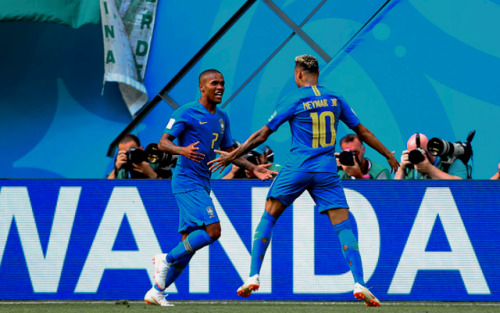 aaronrmsey:Neymar of Brazil celebrates with Douglas Costa of Brazil after scoring his team’s second 