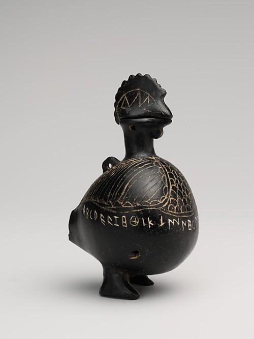 ancientpeoples: Terracotta vase in shape of a rooster  The inscription is the Etruscan alphabet