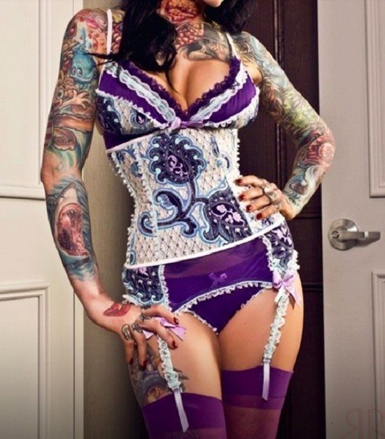 hot-tattooed-girls:  See more —&gt; Hot Tattooed Girls.  Vote for your favorite